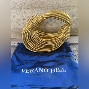 Verano Hill Gold Statement handbag